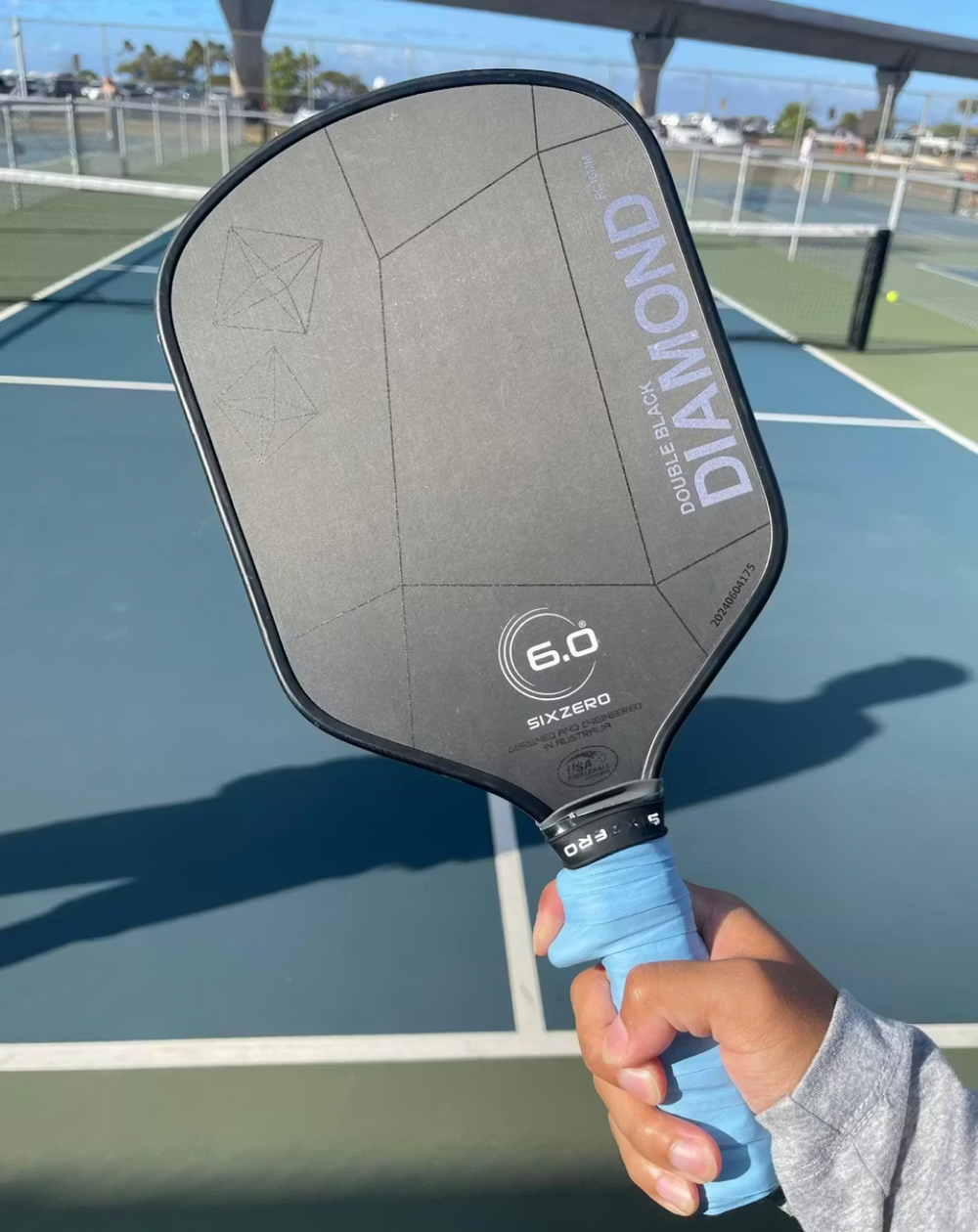 6.0 Paddle with index finger cinched into TriggerGrip Pro