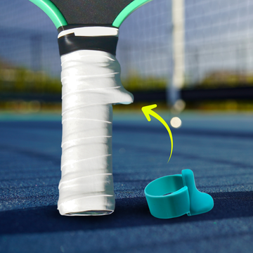 TriggerGrip Pro pickleball grip insert installation showing arctic blue insert positioned under an overgrip to create the trigger ridge for control and consistency