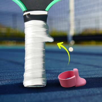 TriggerGrip Pro pickleball grip insert installation showing coral pink insert positioned under an overgrip to create the trigger ridge for control and consistency