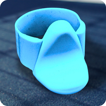 Arctic Blue TriggerGrip Pro pickleball paddle grip insert close-up on court surface